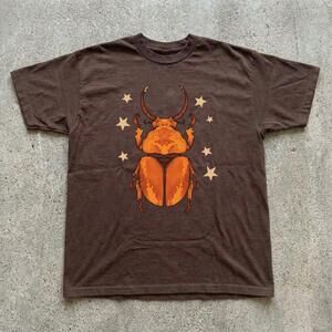 Brown Beetle Graphic Tee With Orange Accents